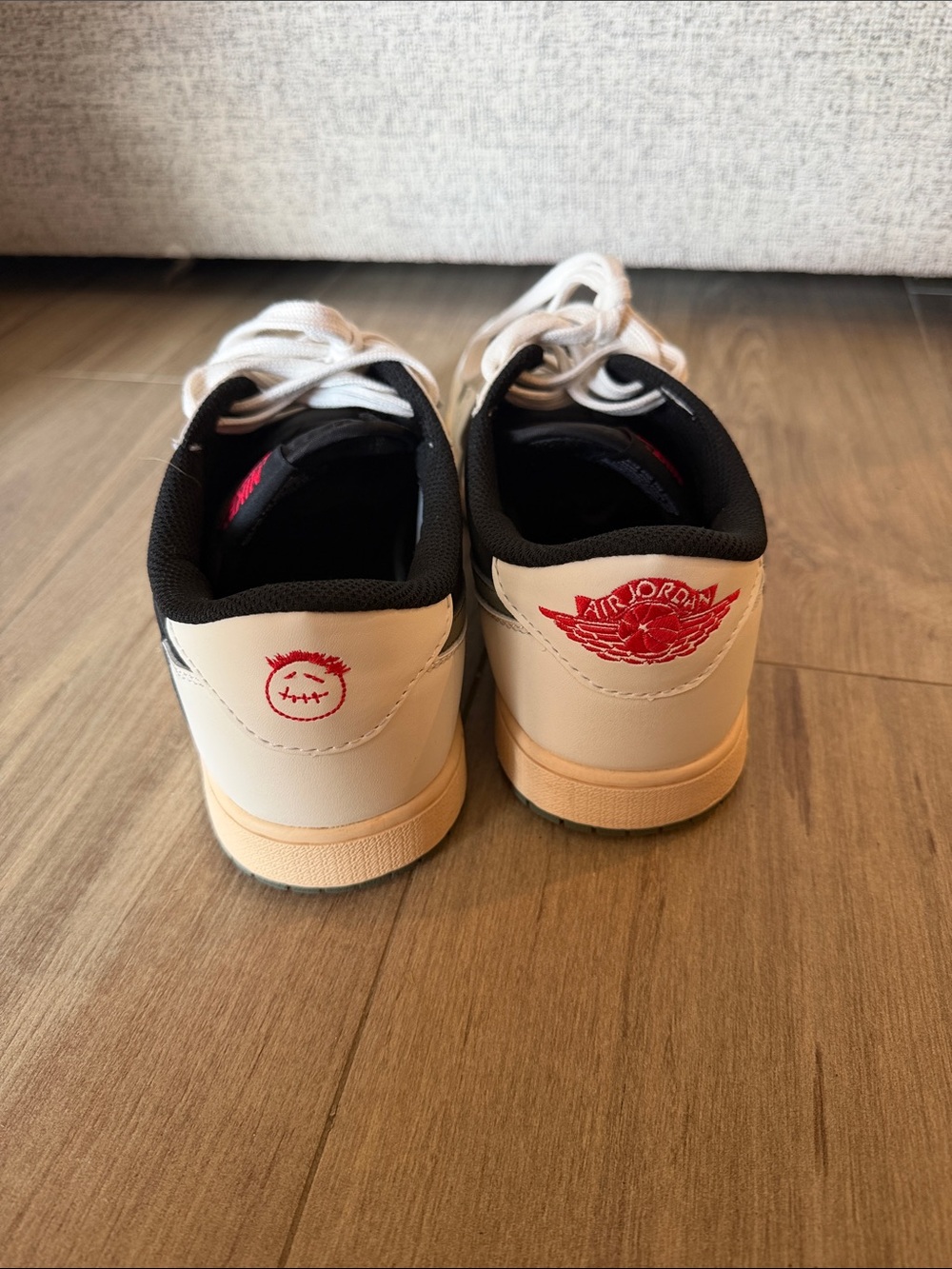 Air Jordan Low Top Sneakers in White with Red Accents